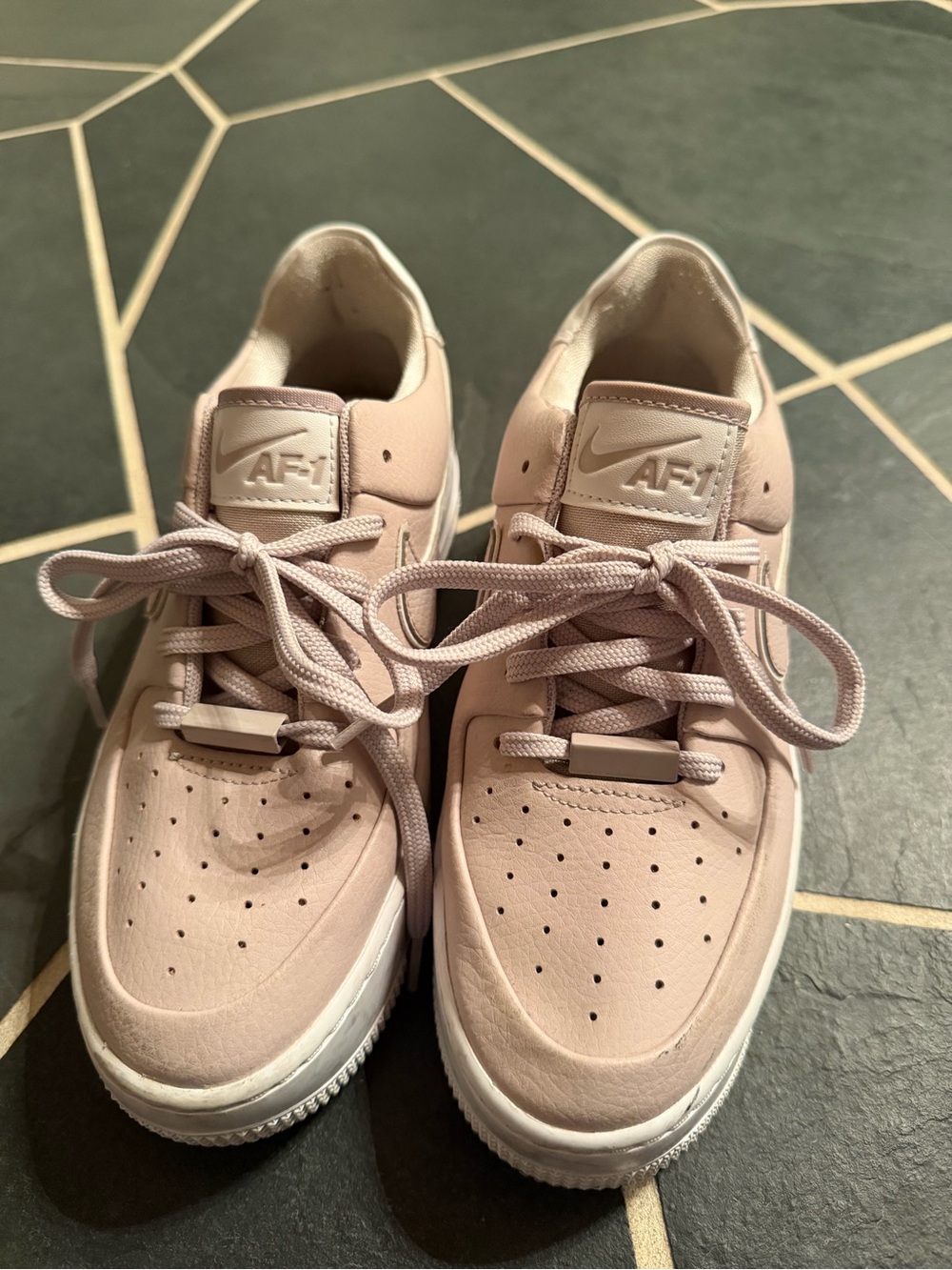 Nike Women's Pale Pink Leather Low-Top Sneakers